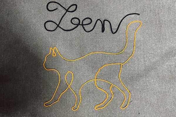 Réalisation d'un couching libre avec écriture et dessin à la machine à coudre