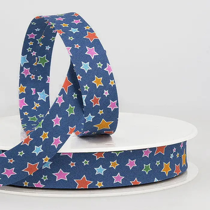Biais bleu avec étoiles colorées 20mm au mètre Biais bleu avec étoiles colorées 20mm au mètre