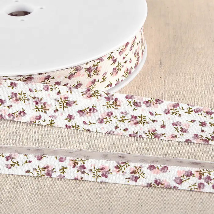 Biais fleurs prune et rose 20mm au mètre Biais fleurs prune et rose 20mm au mètre