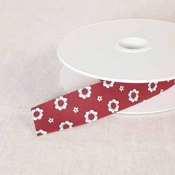 Biais petites fleurs Rouge 25mm /m Biais petites fleurs Rouge 25mm /m