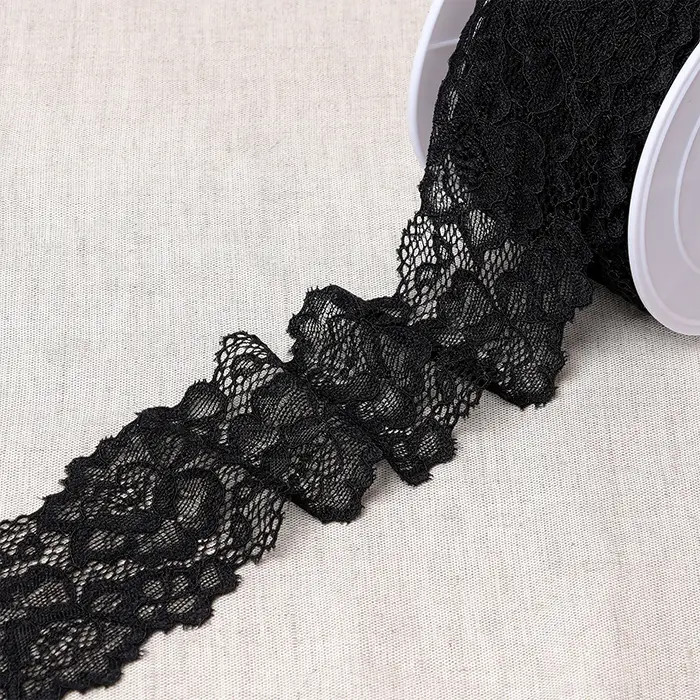 Dentelle élastique entre-deux fleurs noir /m Dentelle élastique entre-deux fleurs noir /m