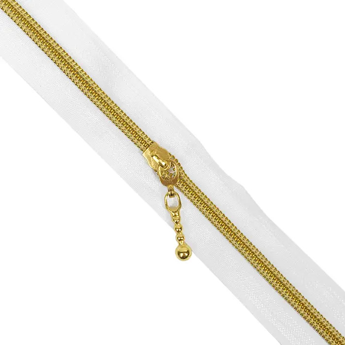 Fermeture à glissière blanche dorée au mètre Fermeture à glissière blanche dorée au mètre