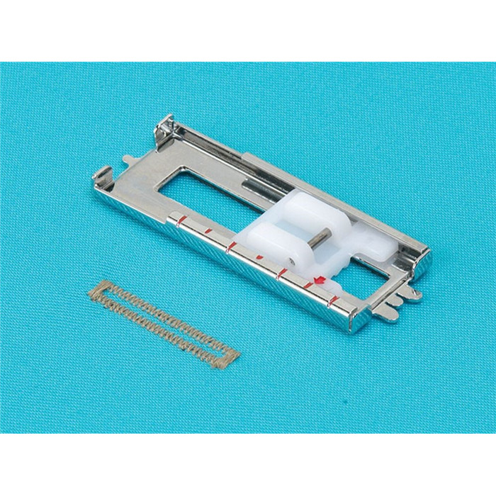 Pied boutonnière 4 étapes en métal Janome / Elna Pied boutonnière 4 étapes en métal Janome / Elna