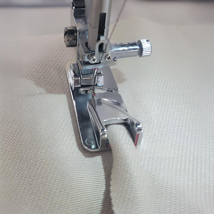 Pied couture rabattue 9mm Janome / Elna (machines 5-7mm) Pied couture rabattue 9mm Janome / Elna (machines 5-7mm)