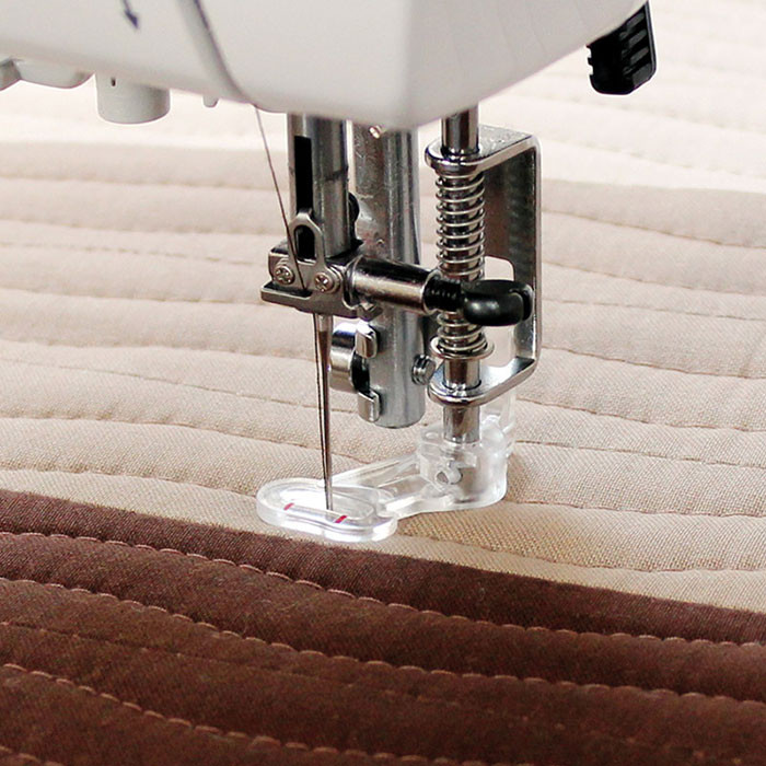 Pied pour quilt, matelassage fermé Pied pour quilt, matelassage fermé