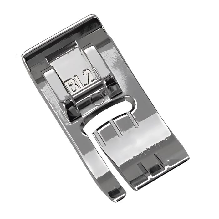 Pied surpiqûre double niveau gauche (5-7mm) Janome / Elna Pied surpiqûre double niveau gauche (5-7mm) Janome / Elna