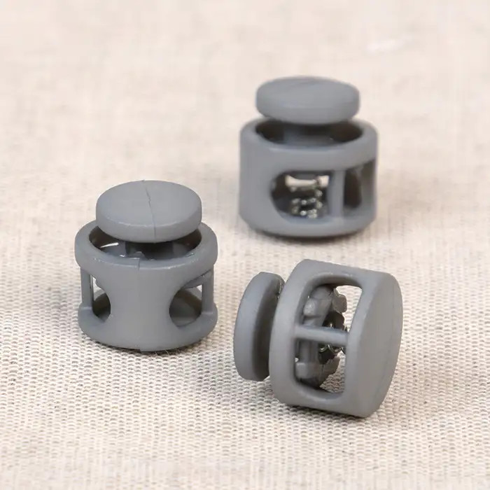 Serre cordon plastique gris Serre cordon plastique gris