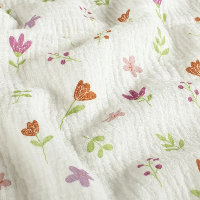 Tissu 100% coton double gaze fleurs fond blanc 140cm /50cm Tissu 100% coton double gaze fleurs fond blanc 140cm /50cm