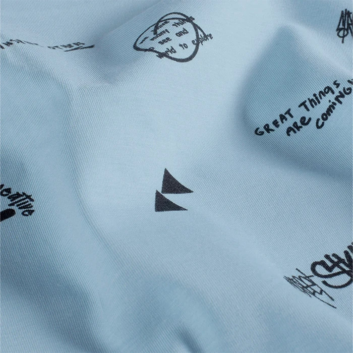 Tissu jersey de coton bleu ciel graffitis 150cm /50cm Tissu jersey de coton bleu ciel graffitis 150cm /50cm